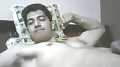 Indian guy cums while flexing muscles